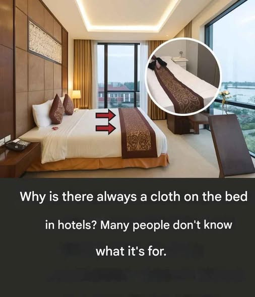 Why Hotels Really Use That Strip Across the Bed