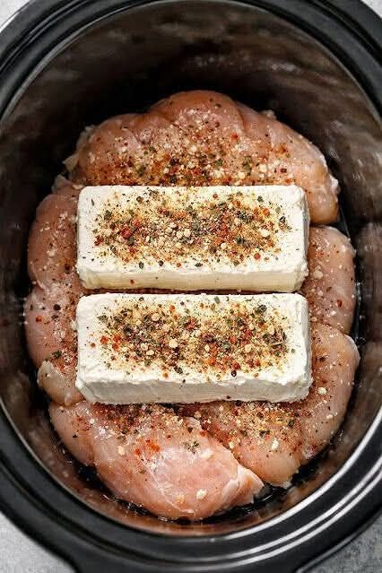 Add raw chicken breasts to the crockpot, layer with cream cheese, and serve a meal so flavorful your family will be asking for seconds.