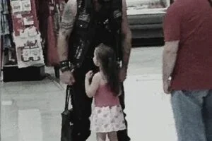 Mute girl rushes to scary biker at Walmart knowing his secret